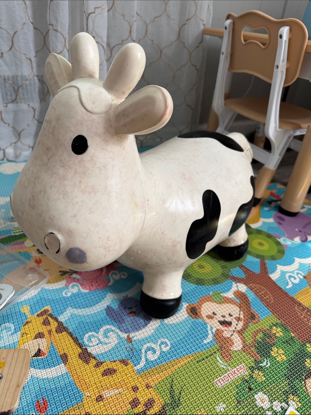 White and Black Cow Hopper Ride-On Toy for Kids